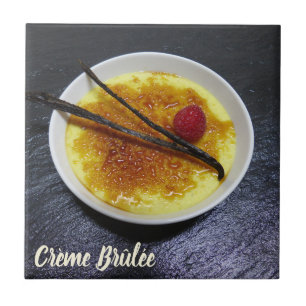 Creme brulee on slate with raspberry and vanilla l ceramic tile