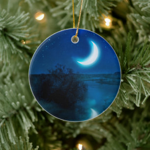 Crescent moon over river in valley ceramic ornament