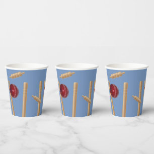 Cricket Ball On Blue Smashing Cricket Stumps, Paper Cups