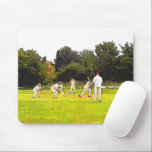 CRICKET MOUSE PAD<br><div class="desc">A simple art design of a Sunday afternoon village cricket match.</div>