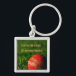 Cricket Red Ball Funny Motivational Key Ring<br><div class="desc">Red Cricket ball on green grass
Cricket isn't life or death... it's much more important.
Motivational and inspirational great for the cricket lover in your life or coach or teammate.</div>