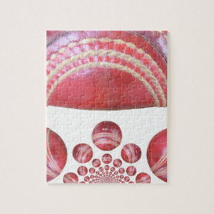Crimson Spin – A Beautiful Red Cricket Ball Arti Jigsaw Puzzle