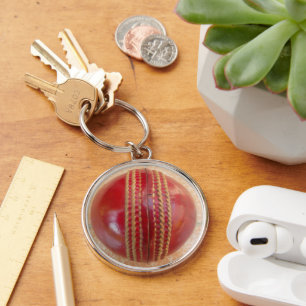 Crimson Stitch Focus: Close-Up of Cricket's Heart Key Ring