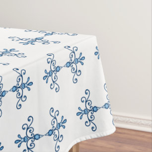 Crisp blue birds on white diamond pattern tablecloth