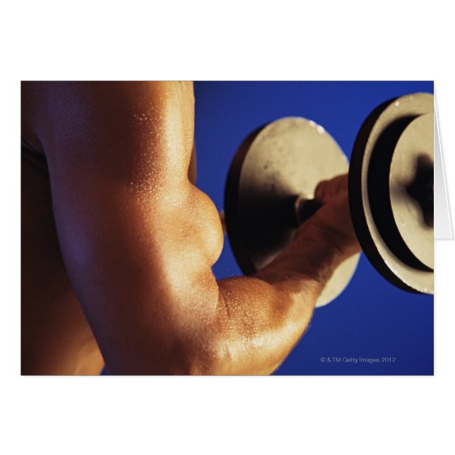 Cropped shot of man lifting weights (Front Horizontal)