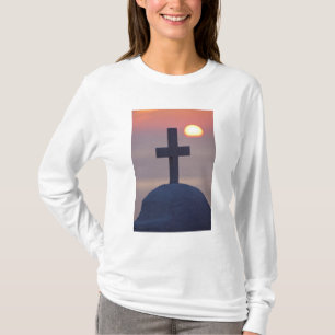 Cross on top of church at sunset, Mykonos,