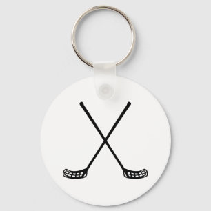 Crossed floorball rackets key ring