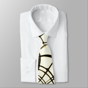 Crossed nut-brown or khaki curved traces up beige tie