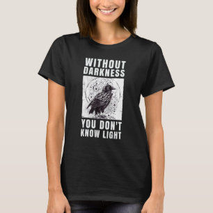 crow raven. Without darkness you don't know light. T-Shirt