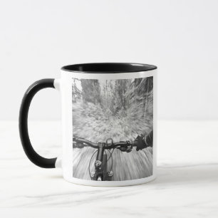Cruising down a buff section of singletrack 2 mug