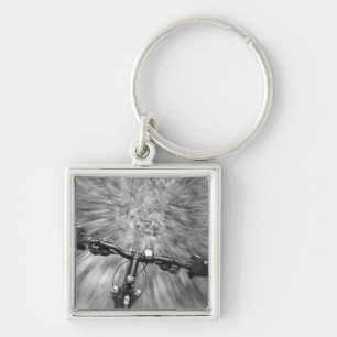 Cruising down a buff section of singletrack key ring