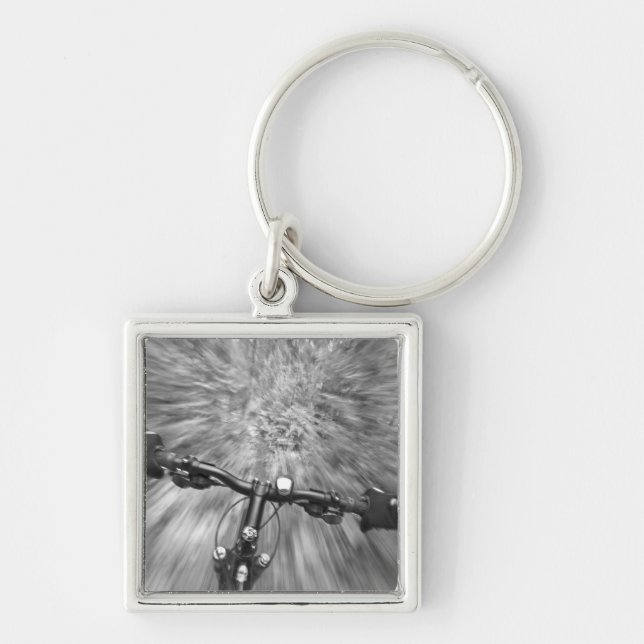 Cruising down a buff section of singletrack key ring (Front)