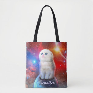 Crying cat in space tote bag