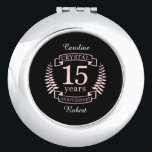 Crystal wedding anniversary 15 years compact mirror<br><div class="desc">A design to celebrate 15 years of marriage. This design has a pink coloured laurel design on a black background. Crystal is the traditional gift for this occasion. The text reads crystal 15 years anniversary. A romantic design to celebrate your 15th year of marriage. If you would like any help...</div>