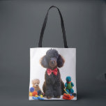 Cuddly Black Poodle Chenille Tote Bag<br><div class="desc">Carry a little bit of comfort and charm wherever you go with the Cuddly Black Poodle Chenille Tote Bag. This delightful tote features an adorable black poodle made from soft chenille fabric, perfectly capturing the fluffy texture of the poodle's coat. Wearing a stylish black bow, the poodle sits sweetly on...</div>