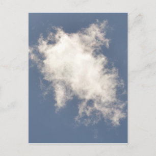 Cumulus Cloud floating in a bright Blue Sky. Postcard