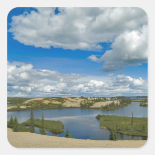 Cumulus clouds float above lakes, Northwest Square Sticker