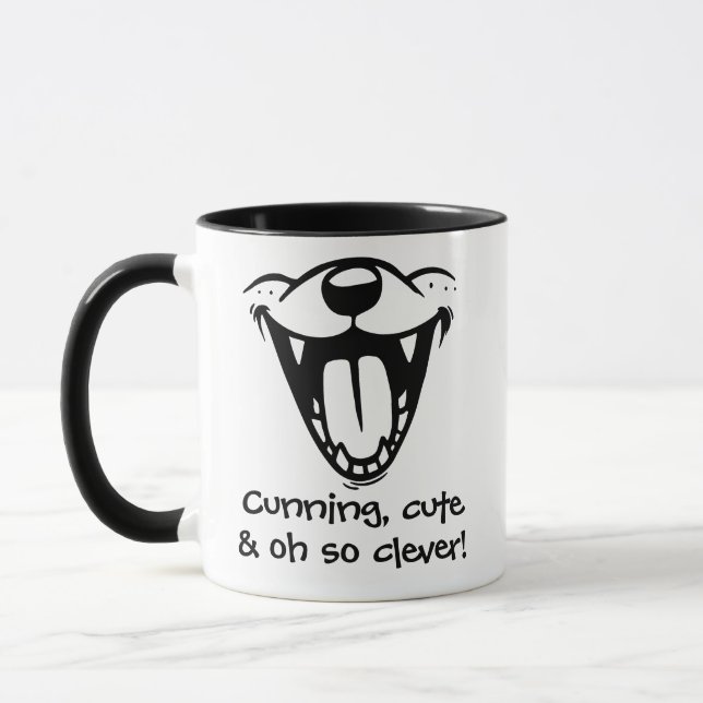 "Cunning, cute, and oh so clever!" Mug (Left)