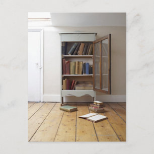 Cupboard full of books. postcard