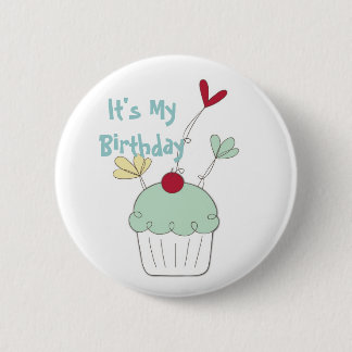 Cupcake birthday badge with cherry and flowers