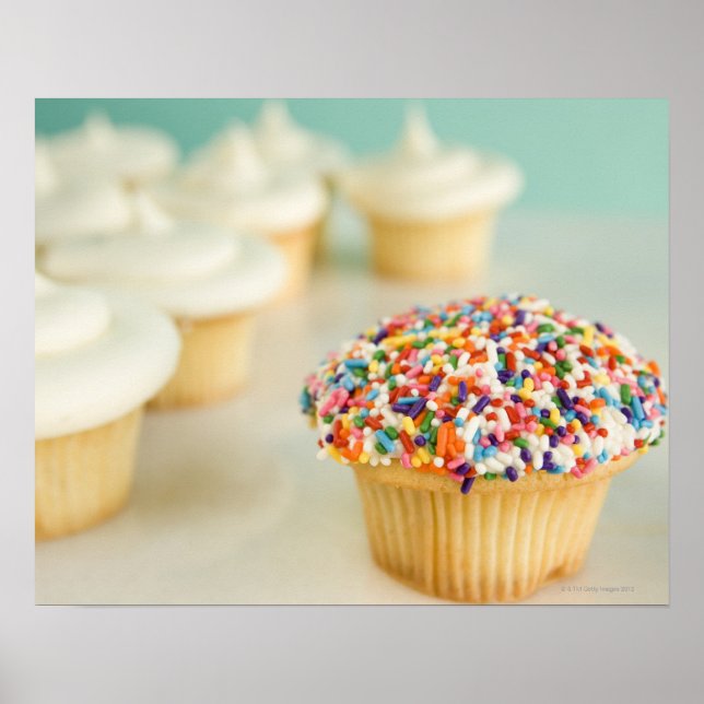 Cupcakes, focus on one in front with poster (Front)