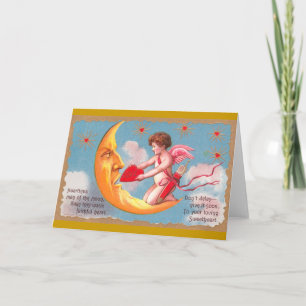 Cupid Feeds Heart to Moon Valentine Holiday Card
