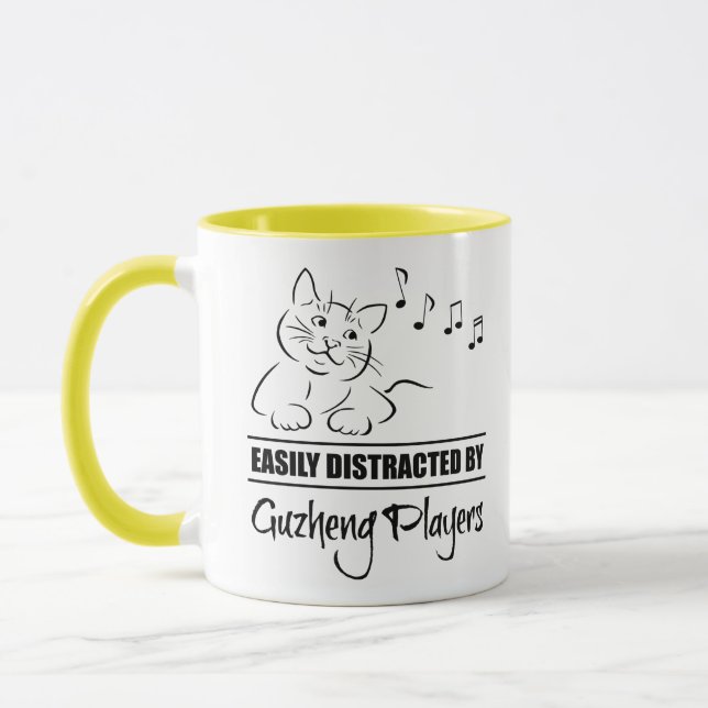 Curious Cat Easily Distracted by Guzheng Players Mug (Left)