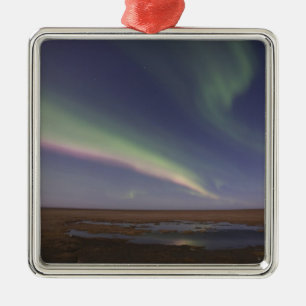 Curtains of coloured northern lights metal ornament