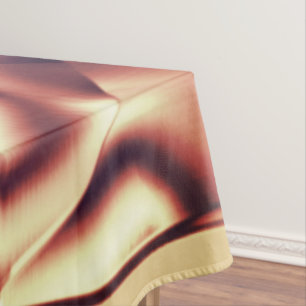 Curved brownish red or burgundy shapes, beige tone tablecloth