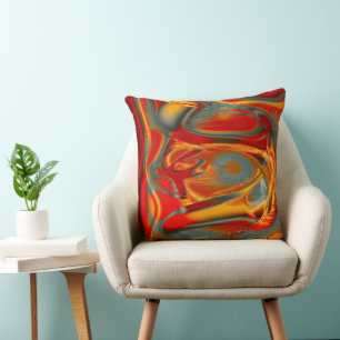 Curved staines in scratched orange to red on grey cushion