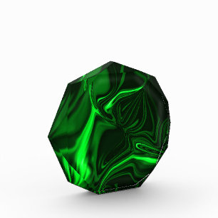 Curves and folds green nickel-plated in dark fund. photo block