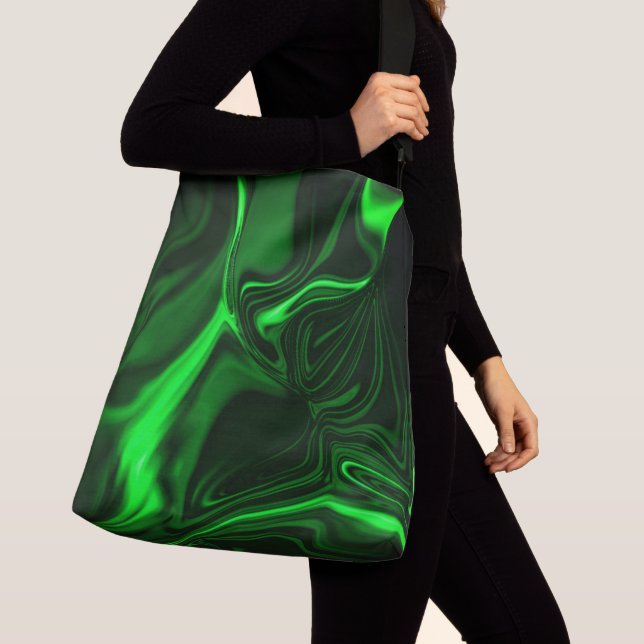 Curves and folds green nickeled on dark background crossbody bag (Close Up)