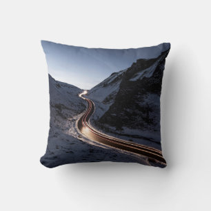CURVY ROAD IN MIDDLE OF SNOW COVERED MOUNTAIN CUSHION
