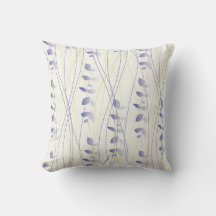 Cushion with difuminated leaf design.
