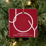 Custom Baby Girl's First Christmas Photo Red Ceramic Ornament<br><div class="desc">This stylish Baby Girl's First Christmas Photo Ornament is decorated with the word JOY on a maroon red background.
Easily customisable with your photo,  name,  and year.</div>
