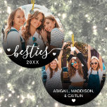 Custom Best Friends Two Photo Ceramic Ornament<br><div class="desc">Create a custom keepsake with this personalised Christmas ornament, featuring a sweet design on both sides. The front includes space for one favourite photo with the word “besties” written across the bottom in a flowing script font, accented by small heart details and the year date. The back offers a clean...</div>