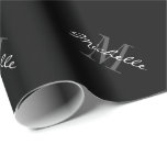 Custom black monogram Christmas wrapping paper<br><div class="desc">Personalised monogram Christmas wrapping paper. Monogrammed wrappingpaper with elegant typography. Add your own name initial letter and colours. Black and white Xmas Holiday giftwrap. Chic design for men women and kids. Available in matte and glossy rolls. Stylish DIY packaging accessories and wrapping supplies. Also nice for Birthday, wedding party, anniversary,...</div>