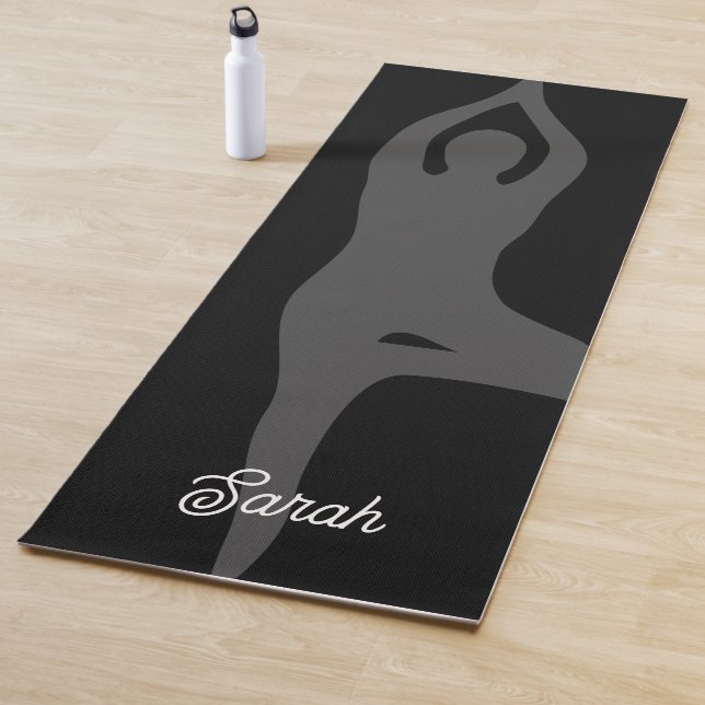 Custom black yoga mat with tree pose silhouette (In Situ)