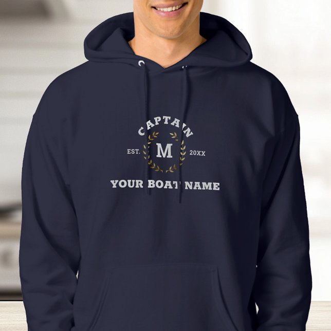 Custom Boat Captain Monogram Gold Laurel Nautical  Hoodie (A person in a navy hoodie with "Captain" text and laurel wreath design. )