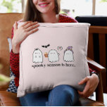 Custom Cute Pink Friendly Ghosts Spooky Season Cushion<br><div class="desc">Elevate your Halloween home decor with this cute pink throw pillow with a friendly ghost trio,  bat,  and spider.  Phrase is customisable on front.  The back is plain black with customisable script text in white.</div>
