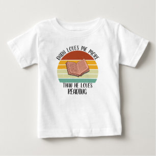 CUSTOM Dada Loves Me More Than He Loves Reading Baby T-Shirt