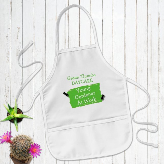 Custom Daycare Artist Green Scrap Paper Pins Art Kids Apron (Try to keep the kids clothes clean with a fun personalized apron in one of three colors. )