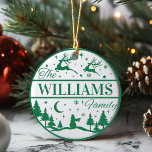 Custom Family Name Classic Christmas Keepsake Ceramic Ornament<br><div class="desc">Add a fun and festive touch to your Christmas tree this year with a personalised ornament that can be passed down for generations. This classic green and white design features reindeer flying above a pine filled snow-scape with a lone snowman standing guard. Personalise by adding your last name. Makes a...</div>