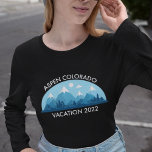 Custom Family Ski Trip Colorado Town Long Sleeve T-Shirt<br><div class="desc">Customised long sleeved women's t-shirt for your ski getaway to the Colorado mountains during your winter vacation. This cool skiing trip long sleeve tee features a cute drawing of snow capped mountains and a blue landscape. A great nature t-shirt for an outdoors loving family for their nature expedition.</div>