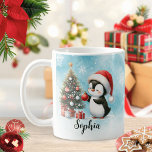 Custom Festive Red and Blue Cute Penguin Christmas Coffee Mug<br><div class="desc">This unique personalised Christmas mug with a snowy blue background features a cute penguin decorating a festive Christmas tree with red ornaments. The adorable penguin in a red Santa hat and the name template in a script font make it easy to create lovely drinkware for kids for the holiday season....</div>