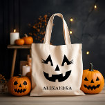 Custom Girly Jack O Lantern Pumpkin Face Halloween Tote Bag<br><div class="desc">Celebrate Halloween in style with this girly custom pumpkin face tote bag that can personalised with a name. This fun jack o lantern design has a bright toothy grin and fabulous eyelashes!</div>