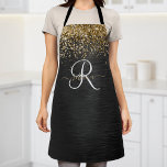 Custom Gold Glitter Black Sparkle Monogram Apron<br><div class="desc">Easily personalise this trendy elegant apron design featuring pretty gold sparkling glitter on a black brushed metallic background.</div>