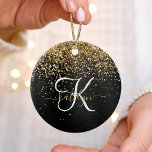 Custom Gold Glitter Black Sparkle Monogram Ceramic Ornament<br><div class="desc">Easily personalise this trendy elegant ornament design featuring pretty gold sparkling glitter on a black brushed metallic background.</div>