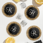 Custom Gold Glitter Black Sparkle Monogram Coaster Set<br><div class="desc">Easily personalise this trendy elegant coaster set design featuring pretty gold sparkling glitter on a black brushed metallic background.</div>