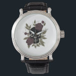 Custom Gothic Skull and Roses Dark Floral Art Watch<br><div class="desc">Add a touch of edgy elegance to your life with this Gothic Skull and Roses design. The artwork features a bold black skull silhouette surrounded by beautifully sketched maroon roses and muted green leaves. This vintage-style illustration captures the "Dark Academia" and tattoo art aesthetic perfectly. It creates a stunning statement...</div>